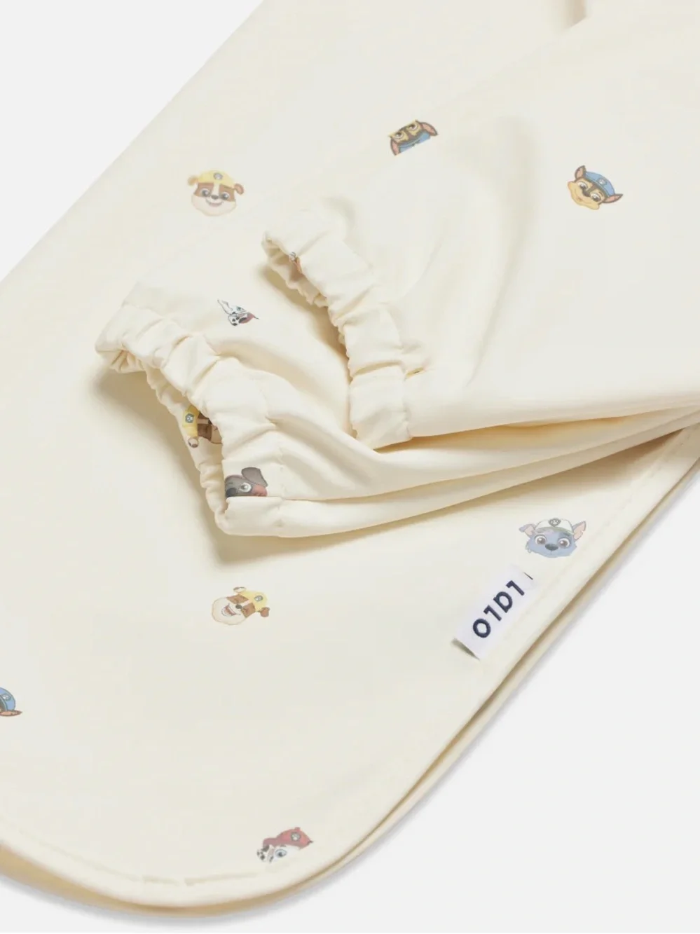 Long-Sleeve Bib Smock in Cream with paw patrol patrol